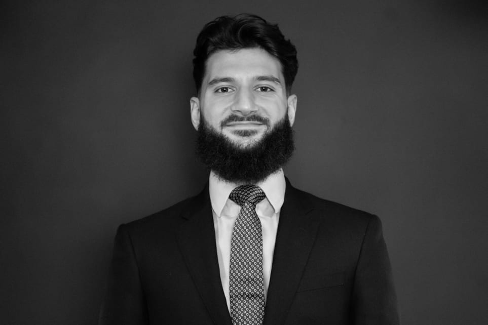 Headshot of Kyle Mustafa, Wealth Advisor for Whiskey & Wealth Club